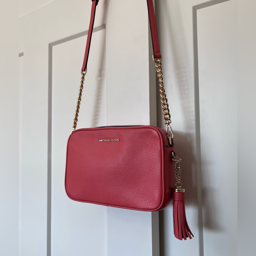 Michael Kors Ginny Medium Coral Leather tasseled crossbody bag purse